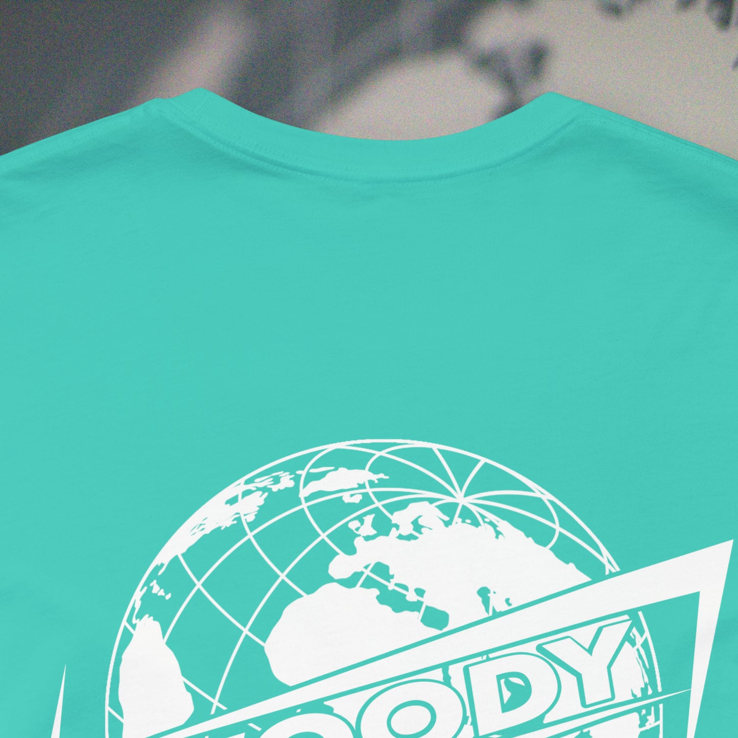 Woody Worldwide - Teal - T-Shirt